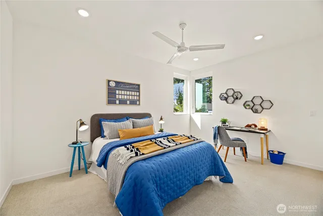 a bed room with a bed and a table