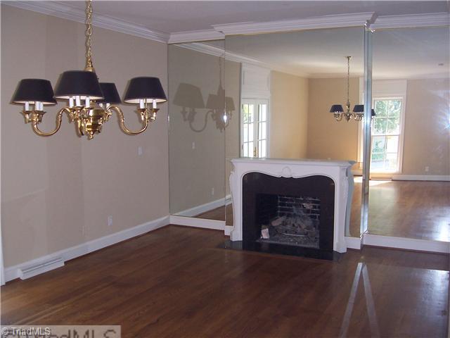 235 Cascade Drive High Point, NC 27265 - Photo 4 of 13 Dining Room. Very spacious dining room features a gas log fireplace and one end, and French doors leading to a couryard that s great for entertaining or just relaxing!