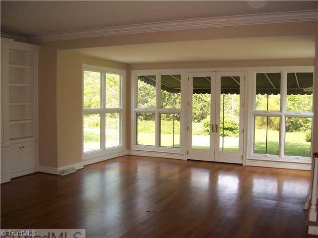 235 Cascade Drive High Point, NC 27265 - Photo 5 of 13 Living Room. The living room features include the nice built-ins as well as these great windows - lots of sunlight and the beautiful view!