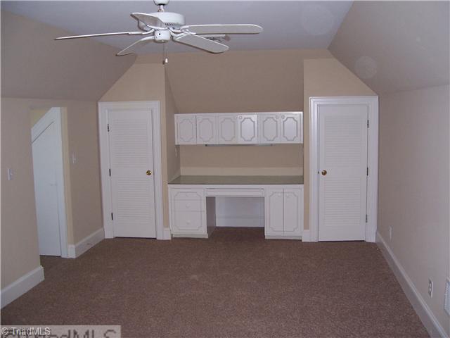 235 Cascade Drive High Point, NC 27265 - Photo 7 of 13 2nd Bedroom. One of the bedrooms on the upper level. Built in vanity / desk.
