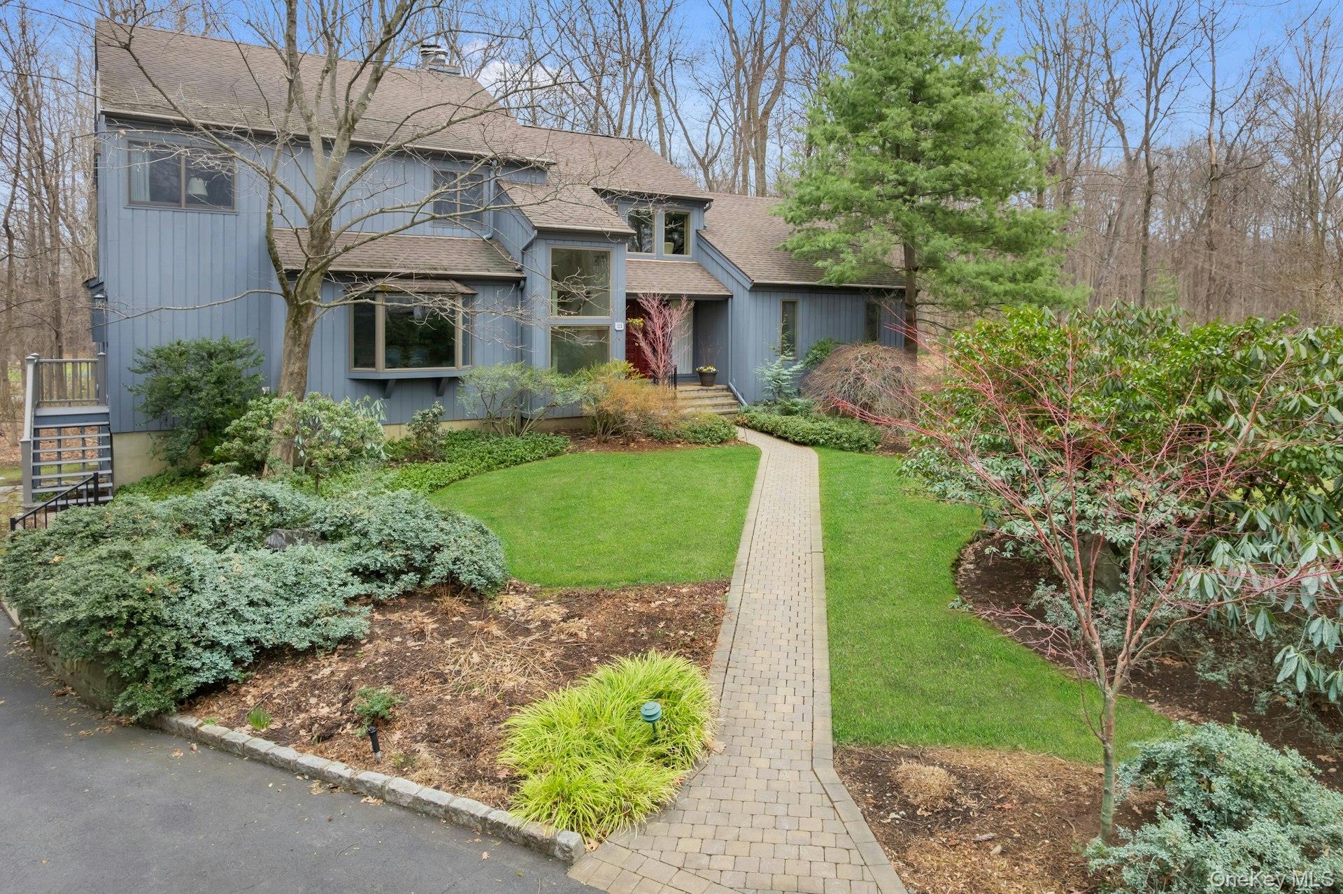 121 Law Road Briarcliff Manor, NY 10510 - Photo 1 of 48 Welcome home to this beautiful updated contemporary home set back from residential Law Road in Briarcliff Manor.