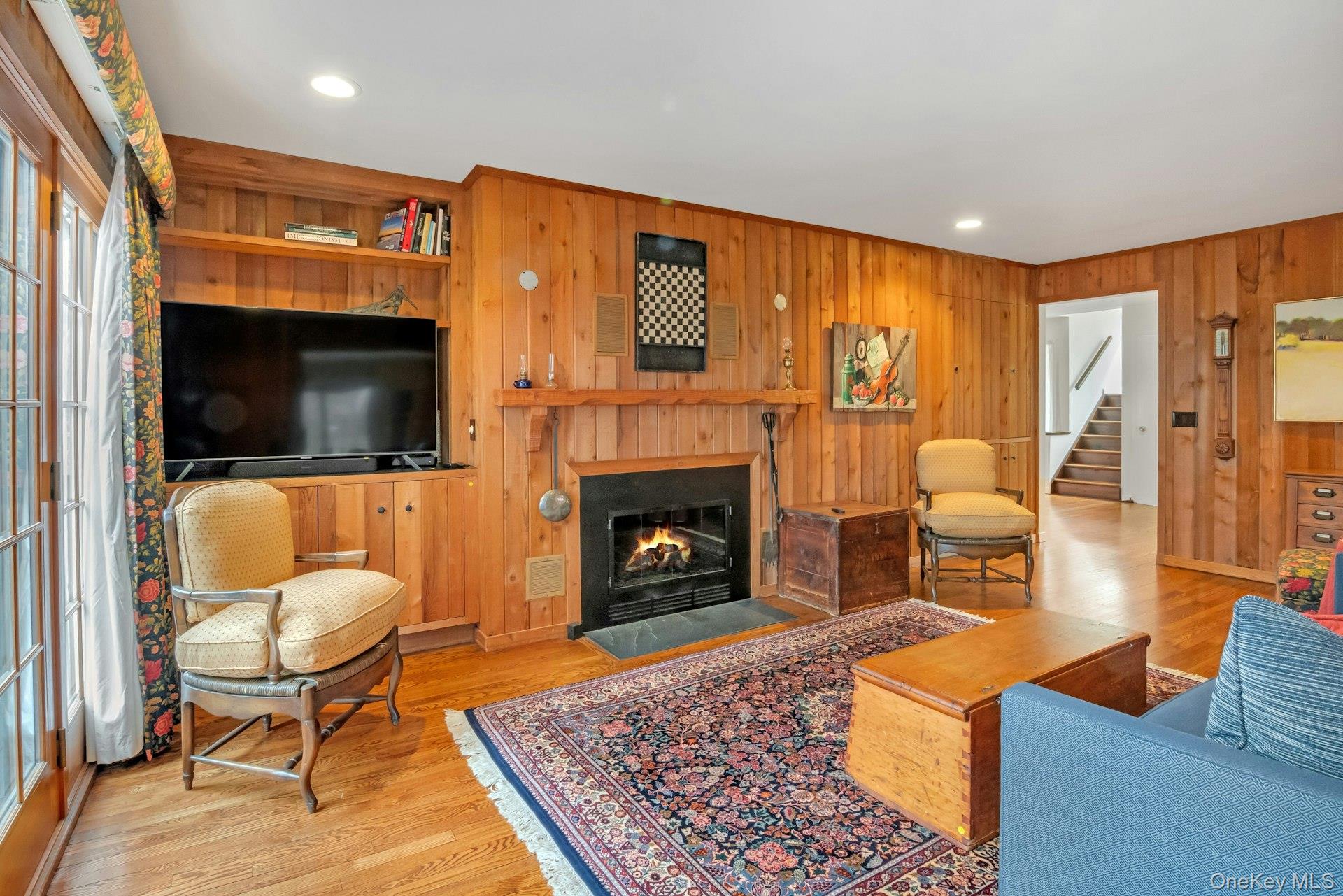 121 Law Road Briarcliff Manor, NY 10510 - Photo 17 of 48 The centerpiece of the Family Room is the gas Fireplace for warm winter nights, and the recessed entertainment area.