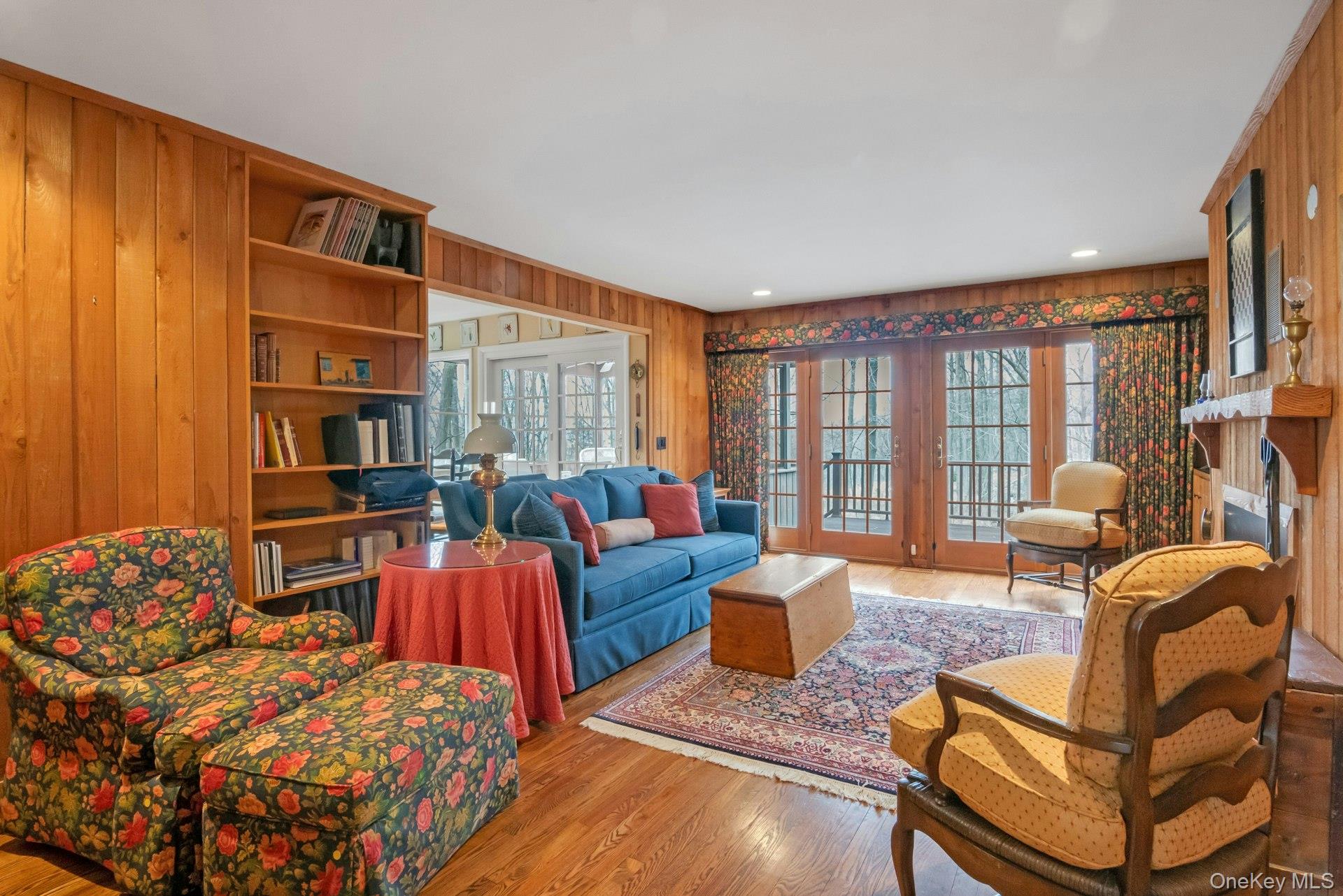 121 Law Road Briarcliff Manor, NY 10510 - Photo 18 of 48 This view of the Family Room shows the built-in bookshelves & sliding French doors to the Trex Deck.