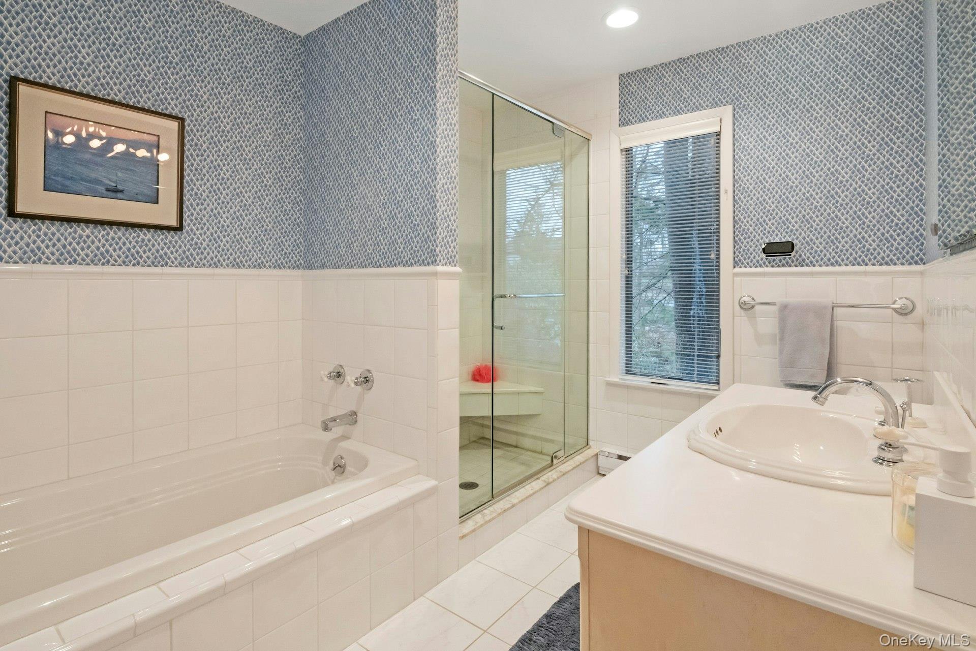 121 Law Road Briarcliff Manor, NY 10510 - Photo 25 of 48 The Primary Bathroom has a tiled, glass door walk-in Shower and a separate Bathtub.