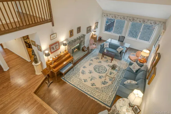 a living room with furniture and a rug