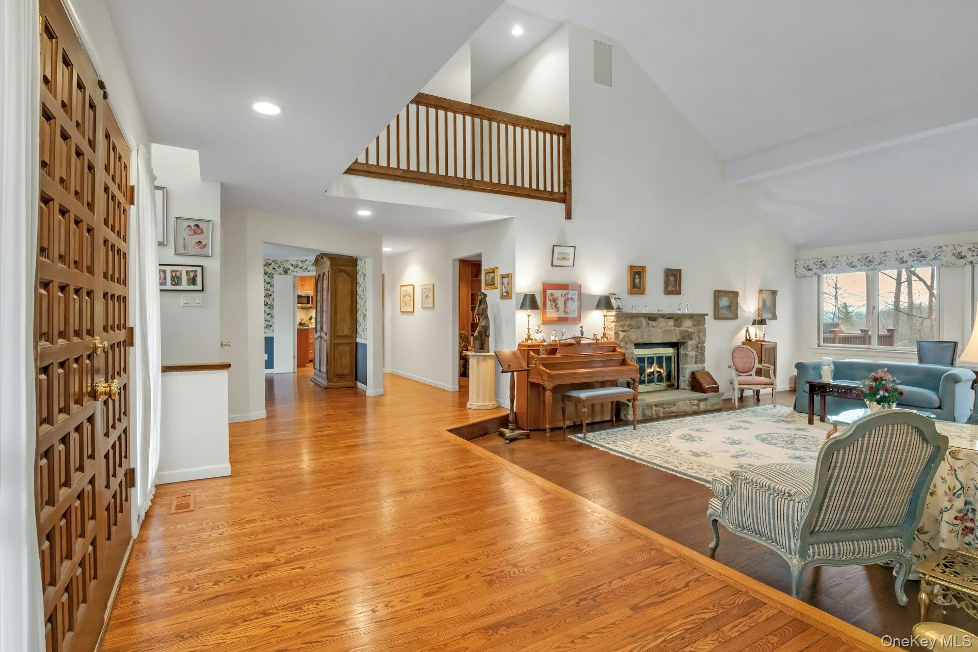 121 Law Road Briarcliff Manor, NY 10510 - Photo 3 of 48 From the Foyer you can see the gleaming hardwood floors throughout the Living Room, Dining Room, Kitchen and Family Room, with cathedral and vaulted ceilings
