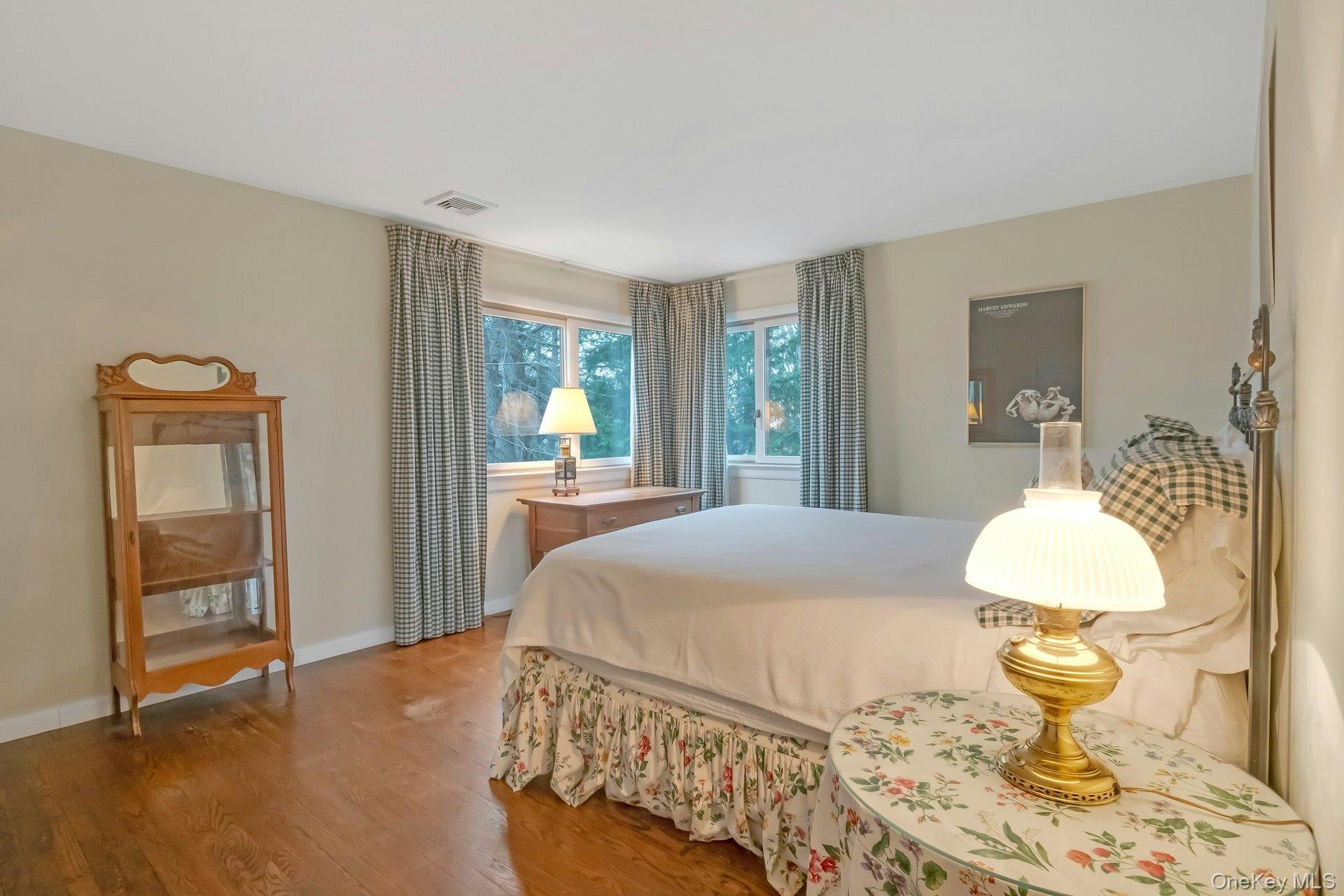 121 Law Road Briarcliff Manor, NY 10510 - Photo 31 of 48 Spacious Corner Third Bedroom, featuring hardwood floors and blackout drapes.