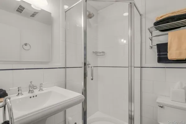 a bathroom with a sink and mirror