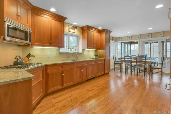 a kitchen with lots of counter top space and appliances