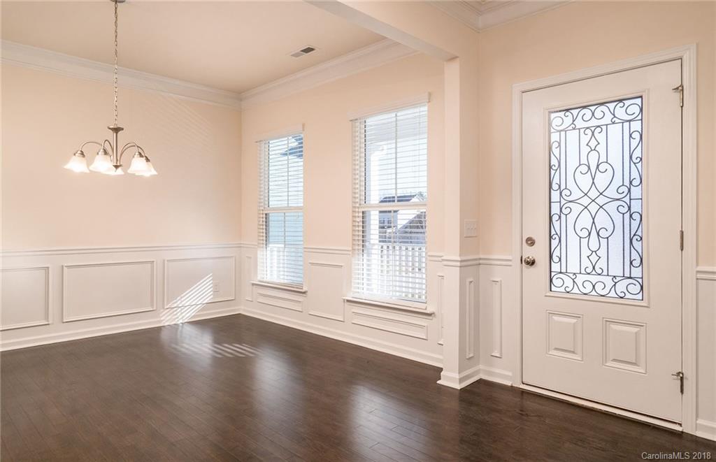 5318 Meadowcroft Way, Unit 62 Fort Mill, SC 29708 - Photo 3 of 19 wooden floor in an empty room with a window