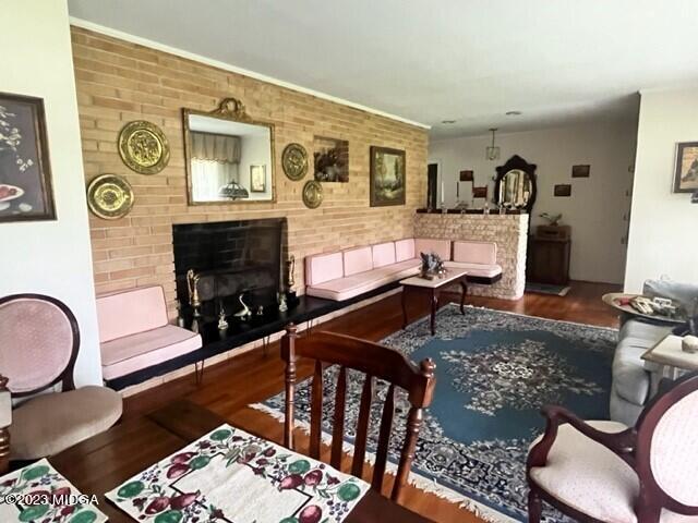 6285 Forsyth Road Macon, GA 31210 - Photo 13 of 24 a living room with furniture and wooden floor
