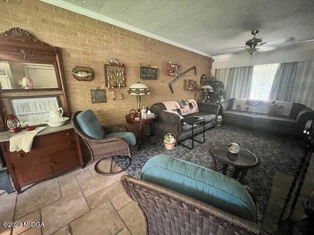 6285 Forsyth Road Macon, GA 31210 - Photo 14 of 24 a living room with furniture and wooden floor