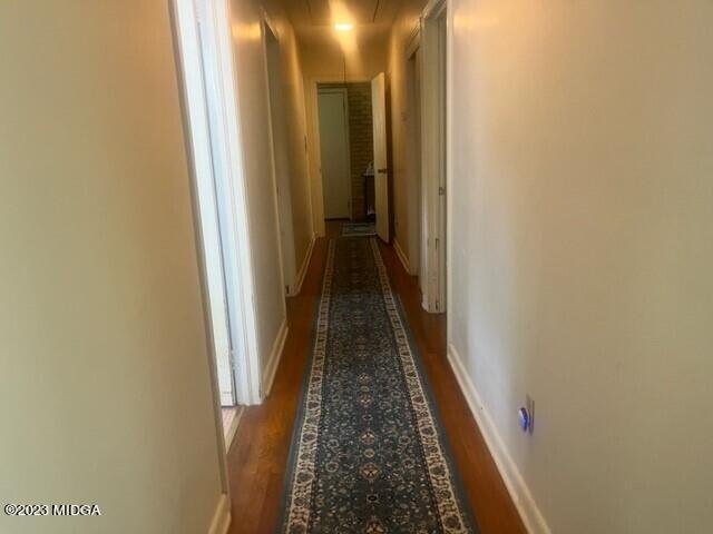 6285 Forsyth Road Macon, GA 31210 - Photo 15 of 24 a view of a hallway with a glass door