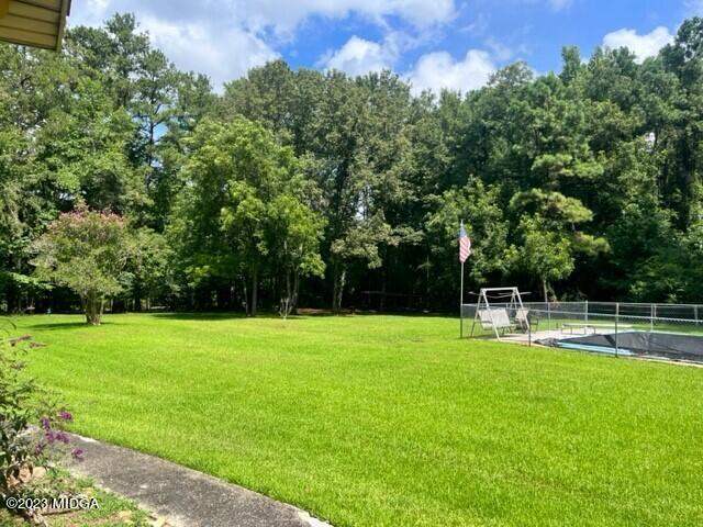 6285 Forsyth Road Macon, GA 31210 - Photo 4 of 24 a view of a back yard