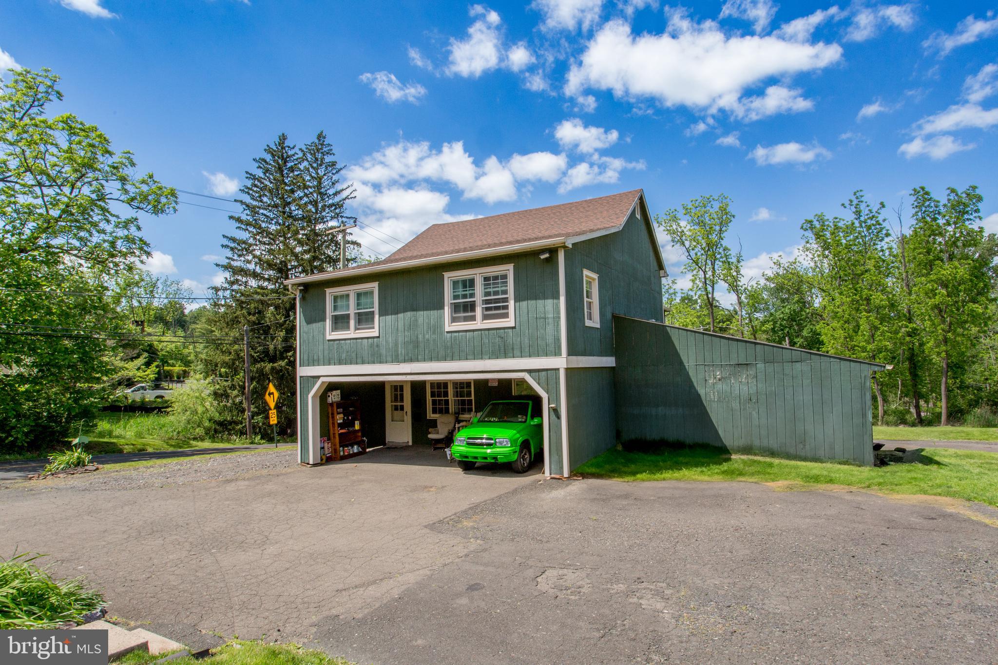 577 Sacketts Ford Road Warminster, PA 18974 - Photo 2 of 5 a view of a house with a yard and potted plants