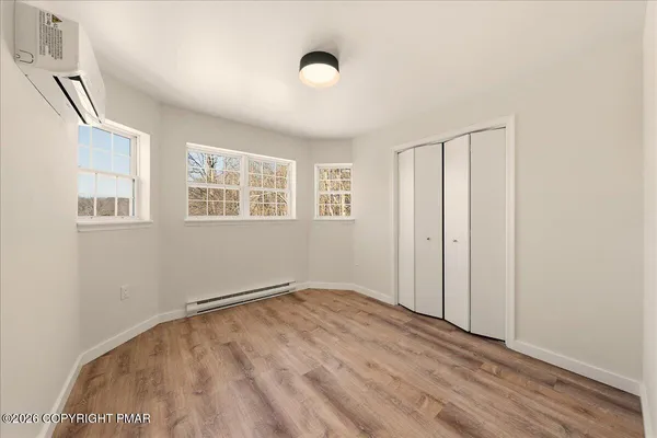 an empty room with windows