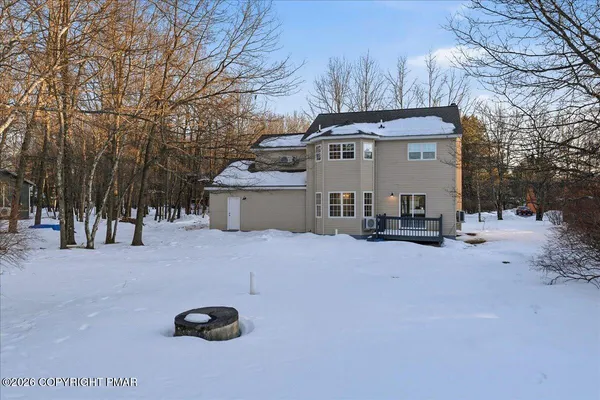 a view of a house with a snow