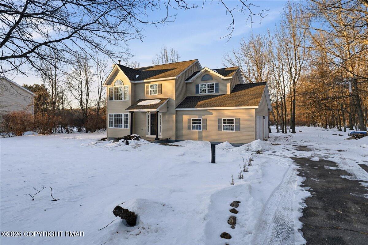 167 Bull Run Long Pond, PA 18334 - Photo 35 of 35 a view of a house with a yard covered in snow