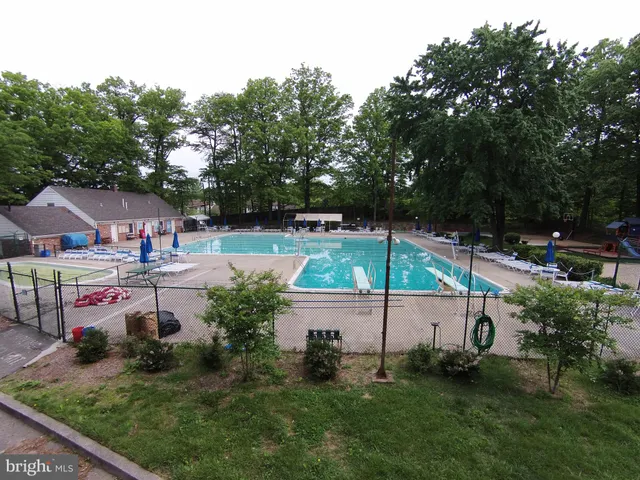 an outdoor sitting area with golf course