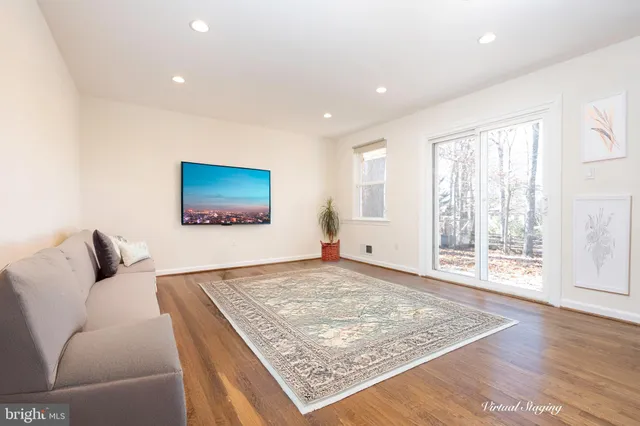 a living room with a rug