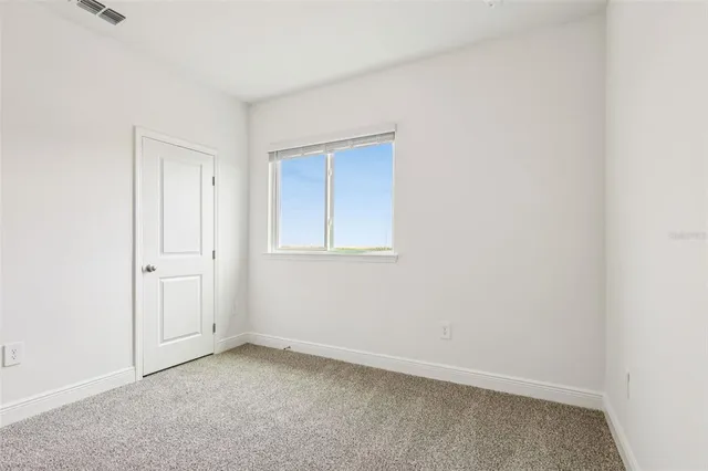 an empty room with a window