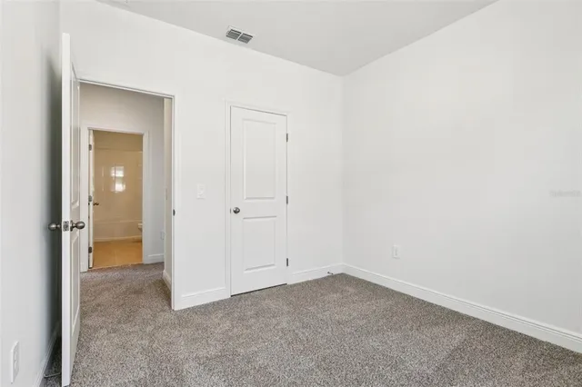 a view of a room with an empty space