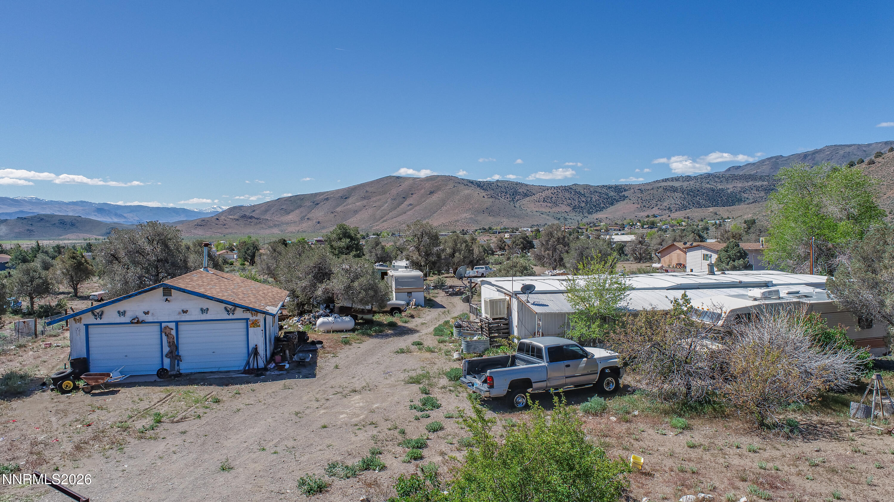 3791 Walker View Road Topaz Ranch Estates, NV 89444 - Photo 1 of 22 a view of a house with a mountain yard