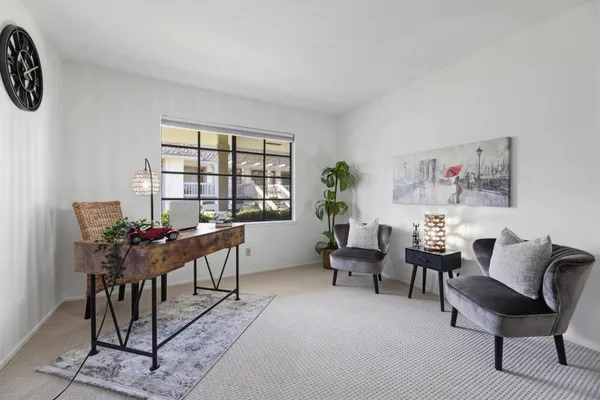 a view of a dining room with furniture