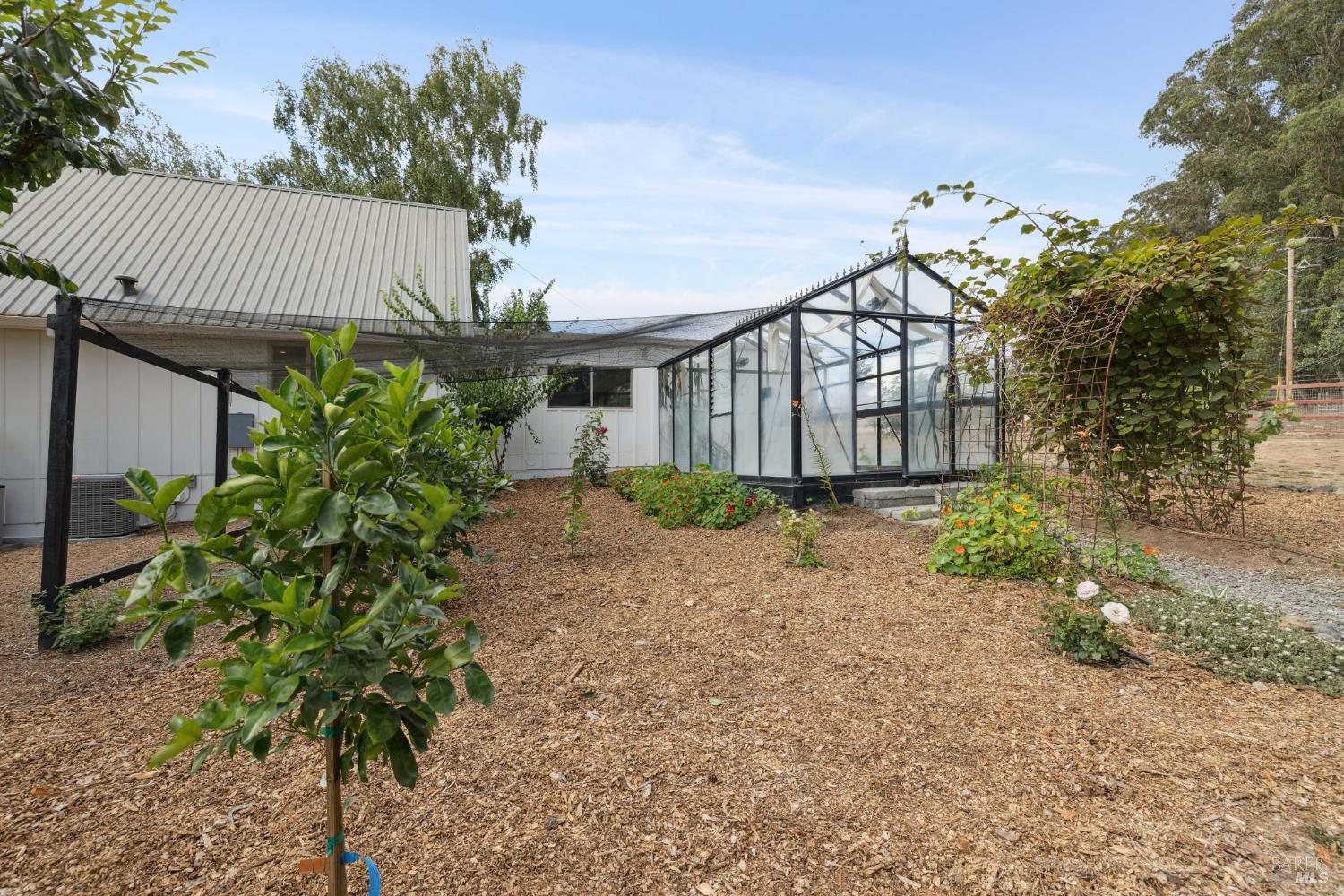 5611 Blank Road Sebastopol, CA 95472 - Photo 54 of 63 a front view of a house with garden