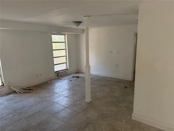 an empty room with windows