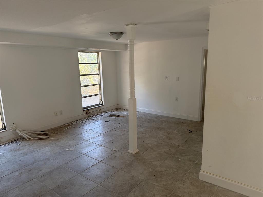 2713 Adams Street West Inverness, FL 34453 - Photo 11 of 11 an empty room with windows