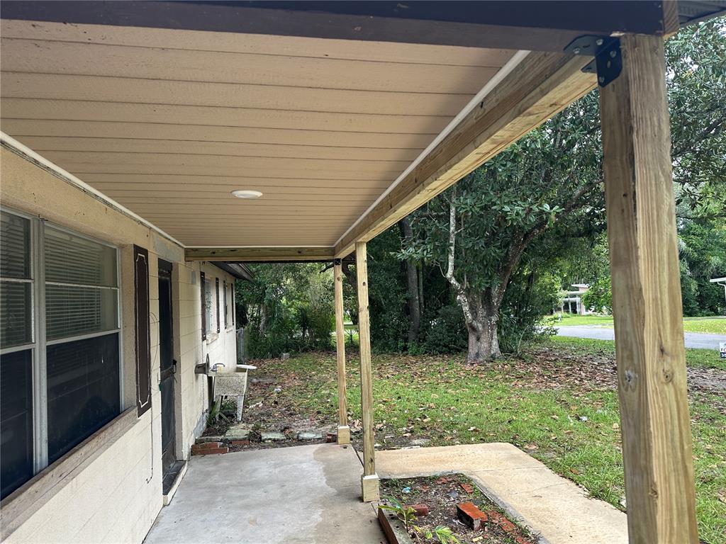 2713 Adams Street West Inverness, FL 34453 - Photo 2 of 6 a view of a couches in the patio
