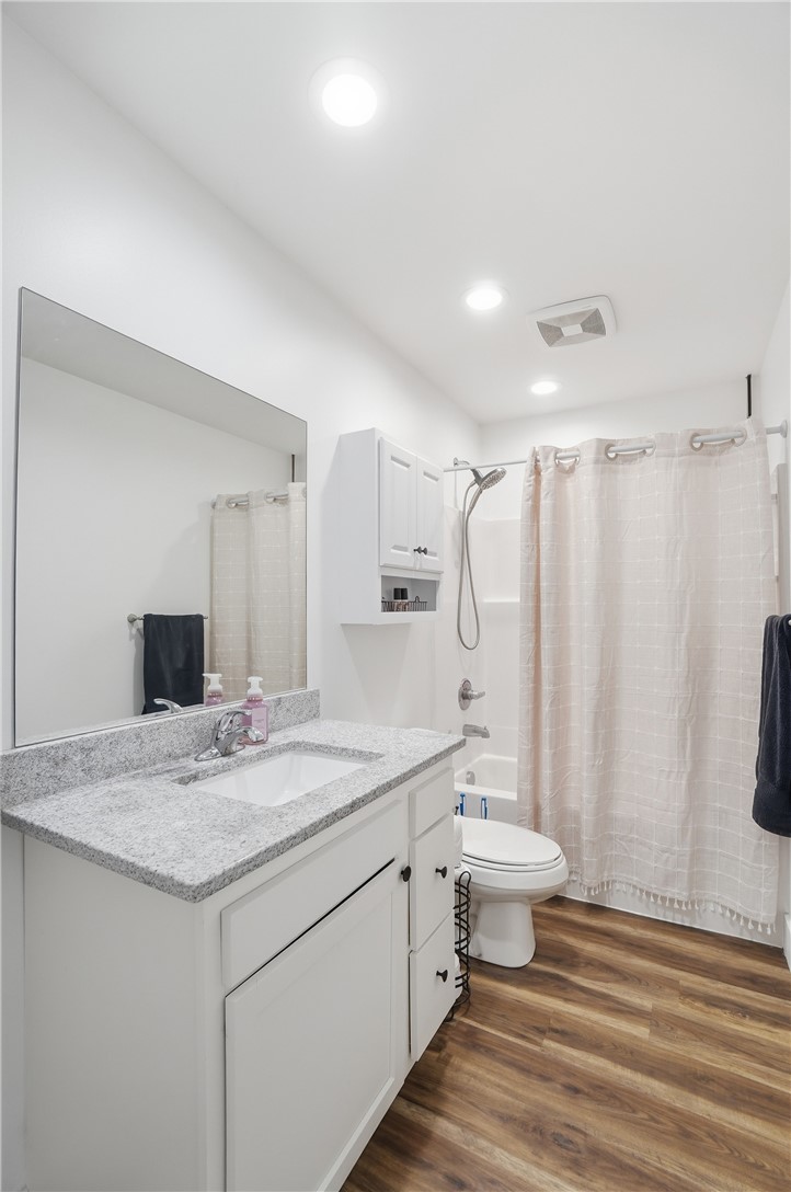 728 East Northern Avenue Springfield, OH 45503 - Photo 26 of 35 This clean and bright bathroom features a vanity with granite counters, offering both style and functionality.