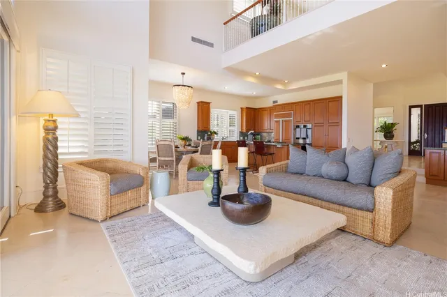 a living room with furniture and a table