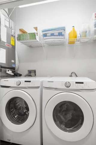 a utility room with dryer and washer