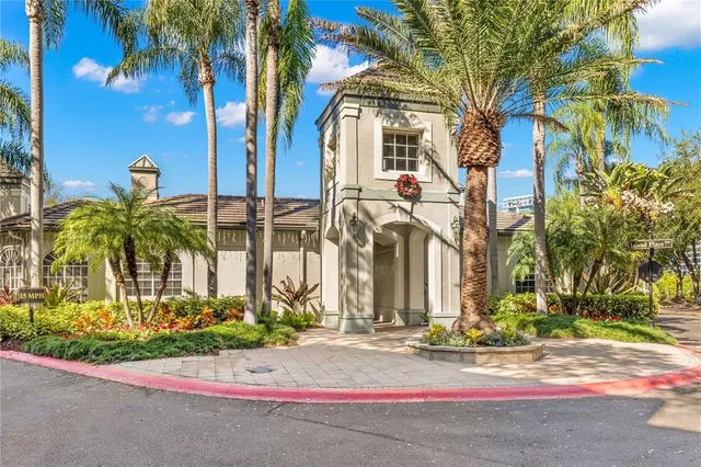 a view of a house with swimming pool and porch with furniture