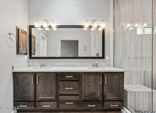 a bathroom with a bathtub and shower