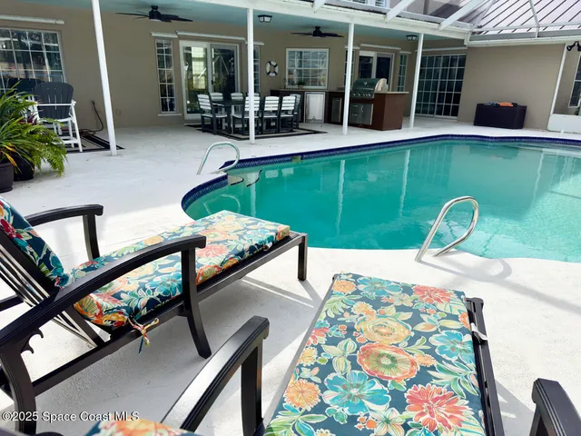 a view of an outdoor dining space with furniture