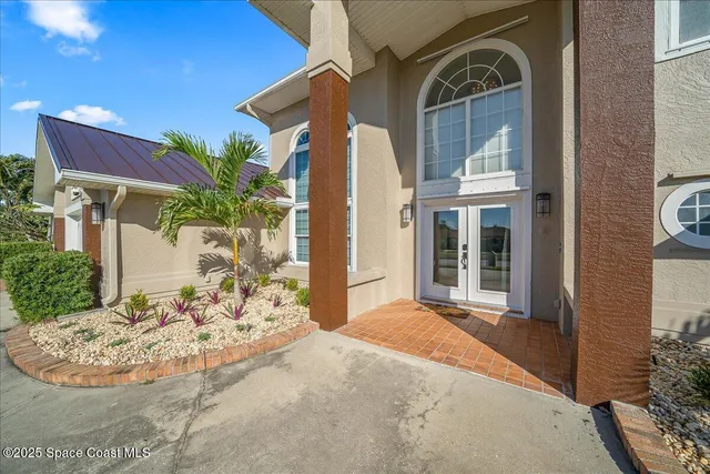 a view of an entryway with a door