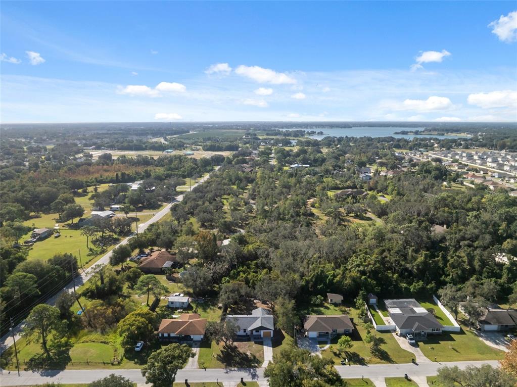606 Kings Lane Southwest Winter Haven, FL 33880 - Photo 46 of 50 an aerial view of a city