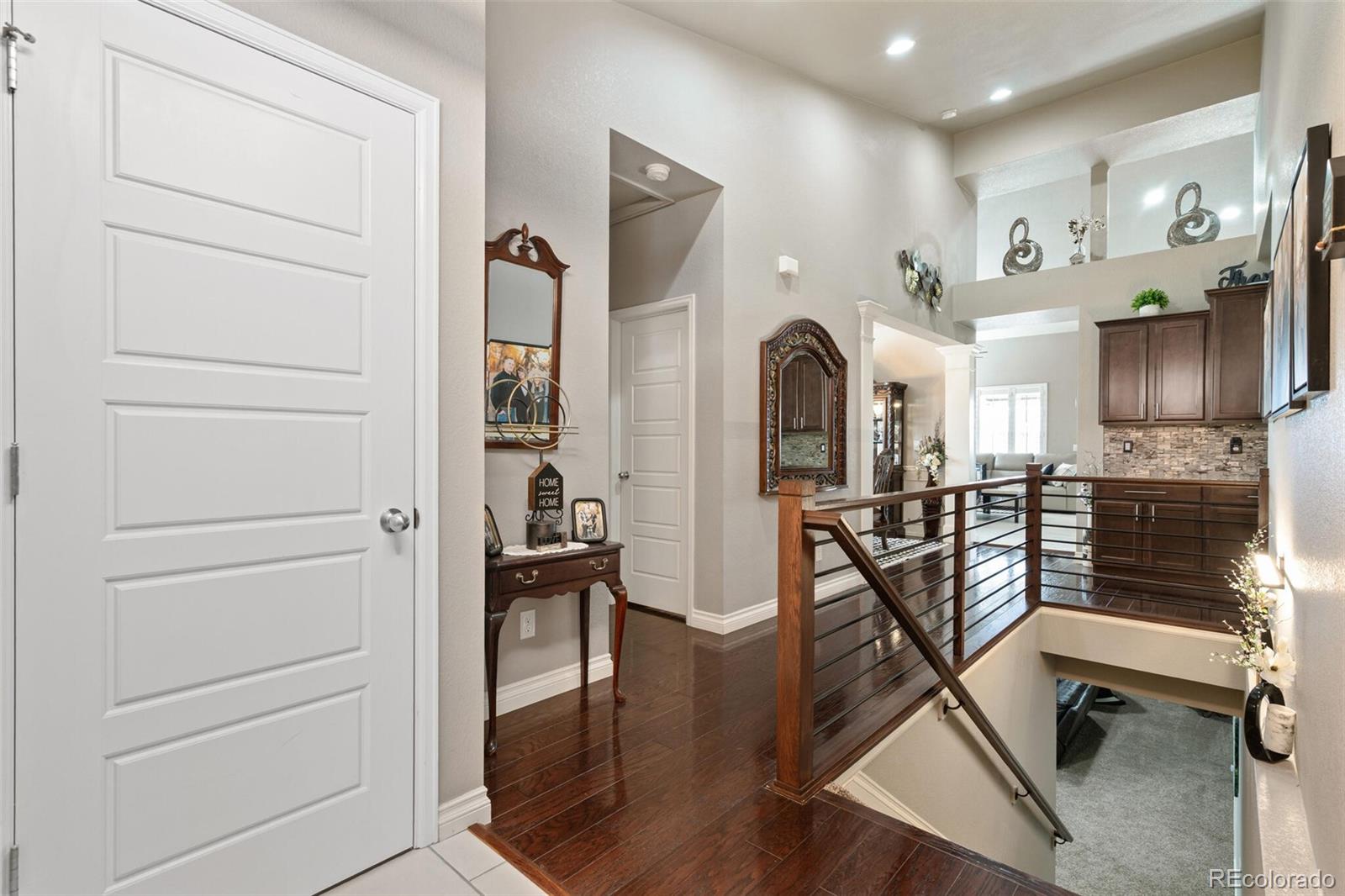 8841 Peakview Avenue Firestone, CO 80504 - Photo 13 of 40 a view of living room and kitchen