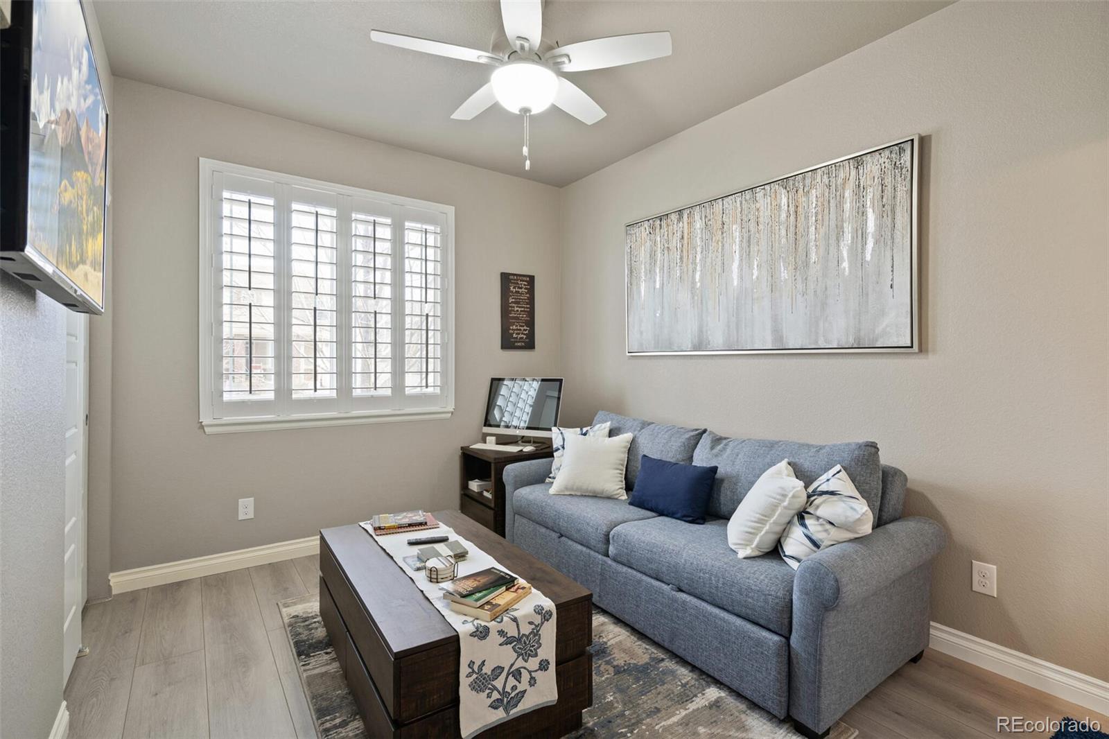 8841 Peakview Avenue Firestone, CO 80504 - Photo 20 of 40 a living room with furniture and a window