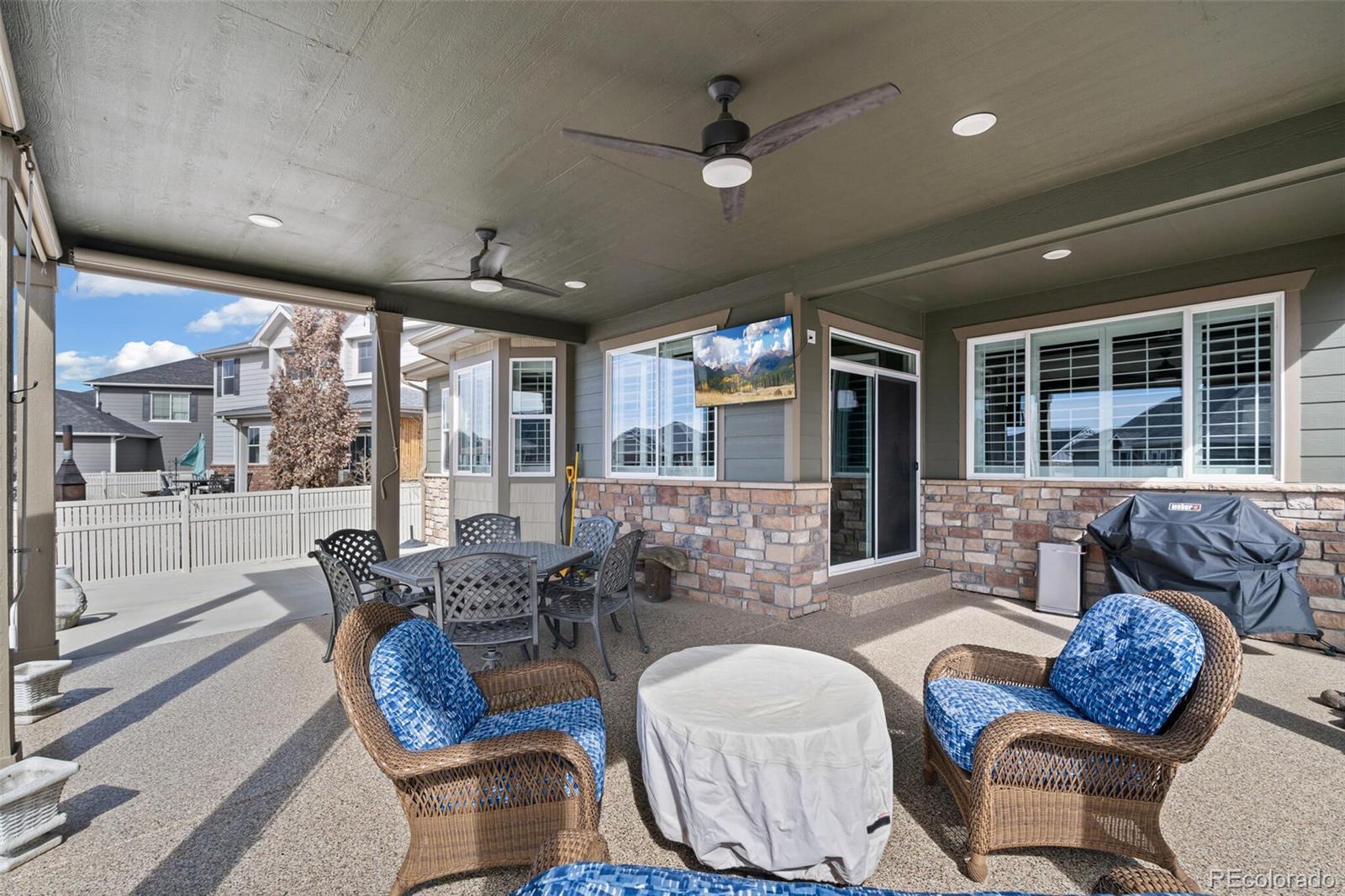 8841 Peakview Avenue Firestone, CO 80504 - Photo 31 of 40 a living room with furniture and a large window