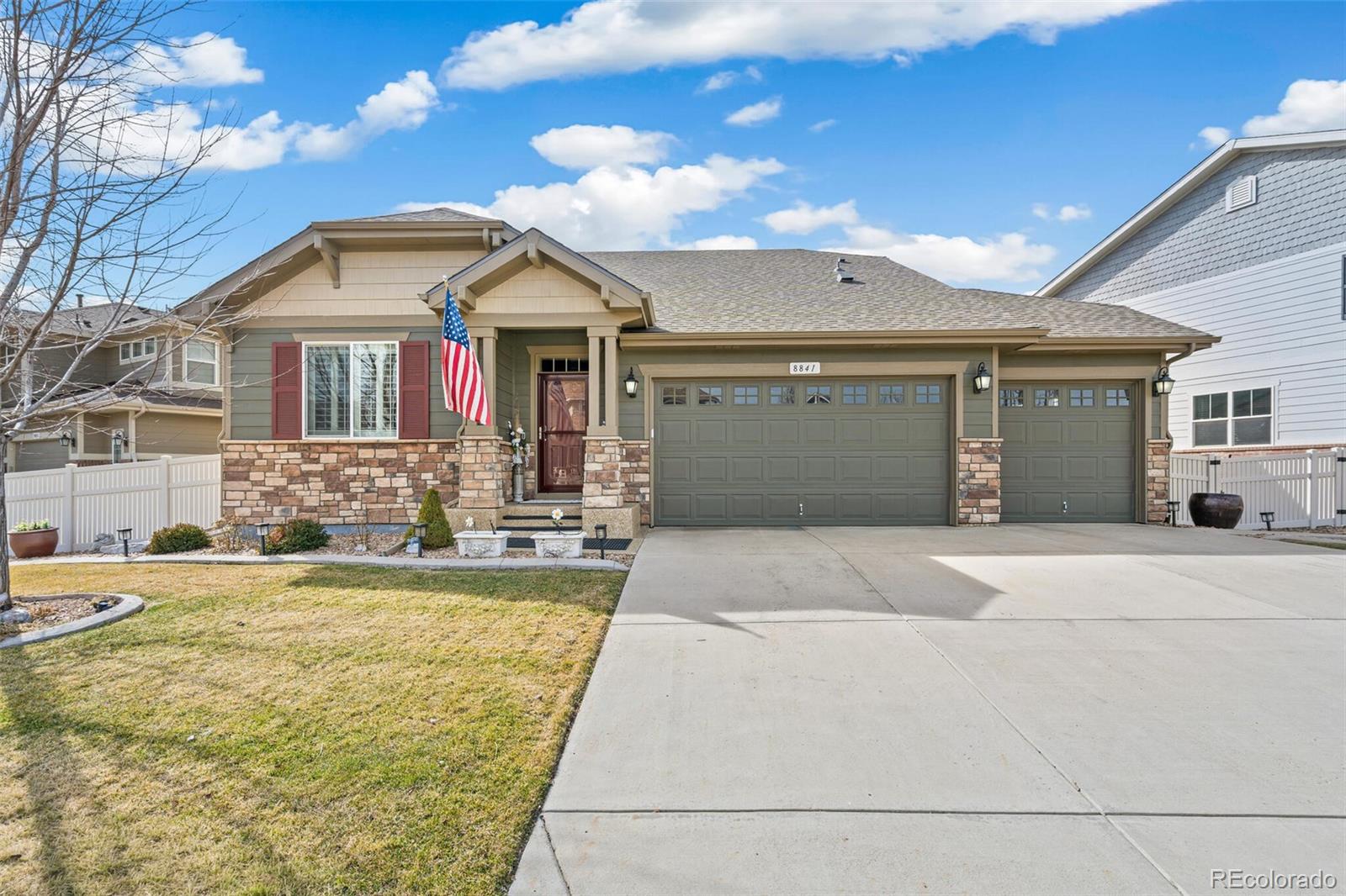 8841 Peakview Avenue Firestone, CO 80504 - Photo 37 of 40 a front view of a house with a yard