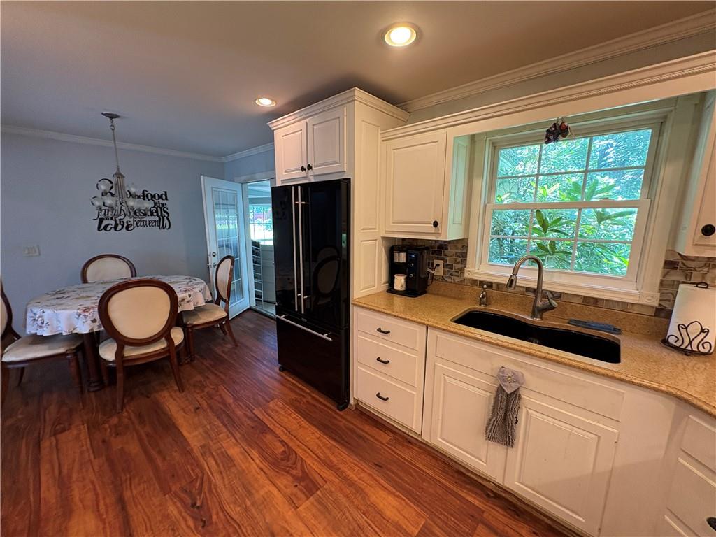 94 Middle Road Reynoldsville, PA 15851 - Photo 14 of 36 a kitchen with stainless steel appliances a sink a stove a refrigerator cabinets and dining table