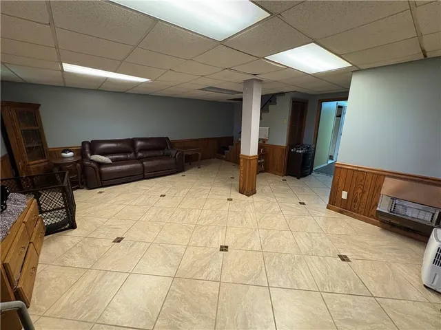 a view of entryway with kitchen