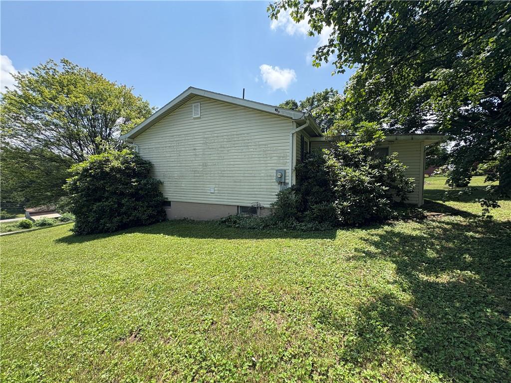 94 Middle Road Reynoldsville, PA 15851 - Photo 3 of 36 a view of backyard with garden