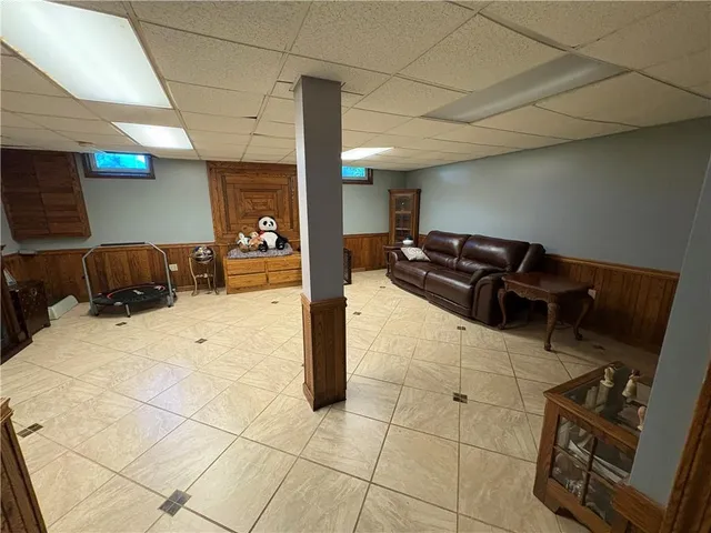 a view of a storage and utility room with a sink