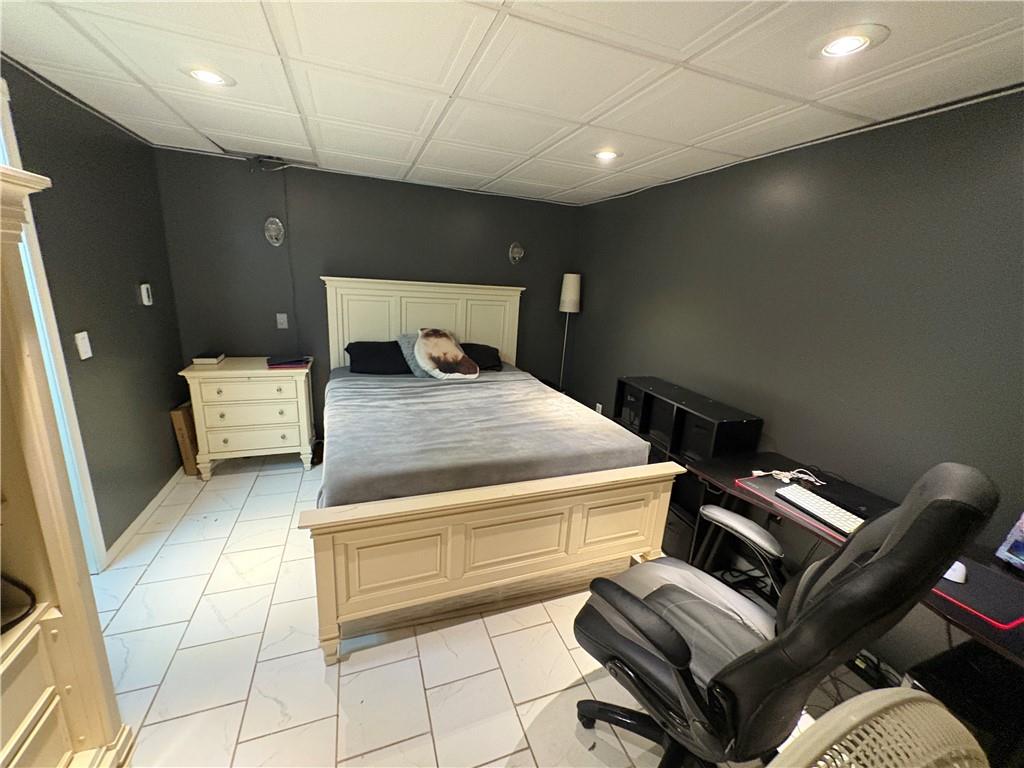 94 Middle Road Reynoldsville, PA 15851 - Photo 35 of 36 a bedroom with a bed and wooden floor