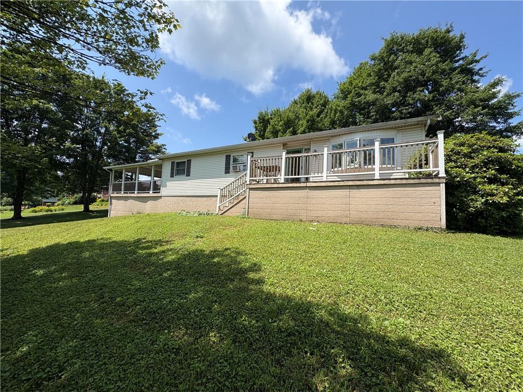 94 Middle Road Reynoldsville, PA 15851 - Photo 5 of 36 a front view of house with yard and green space